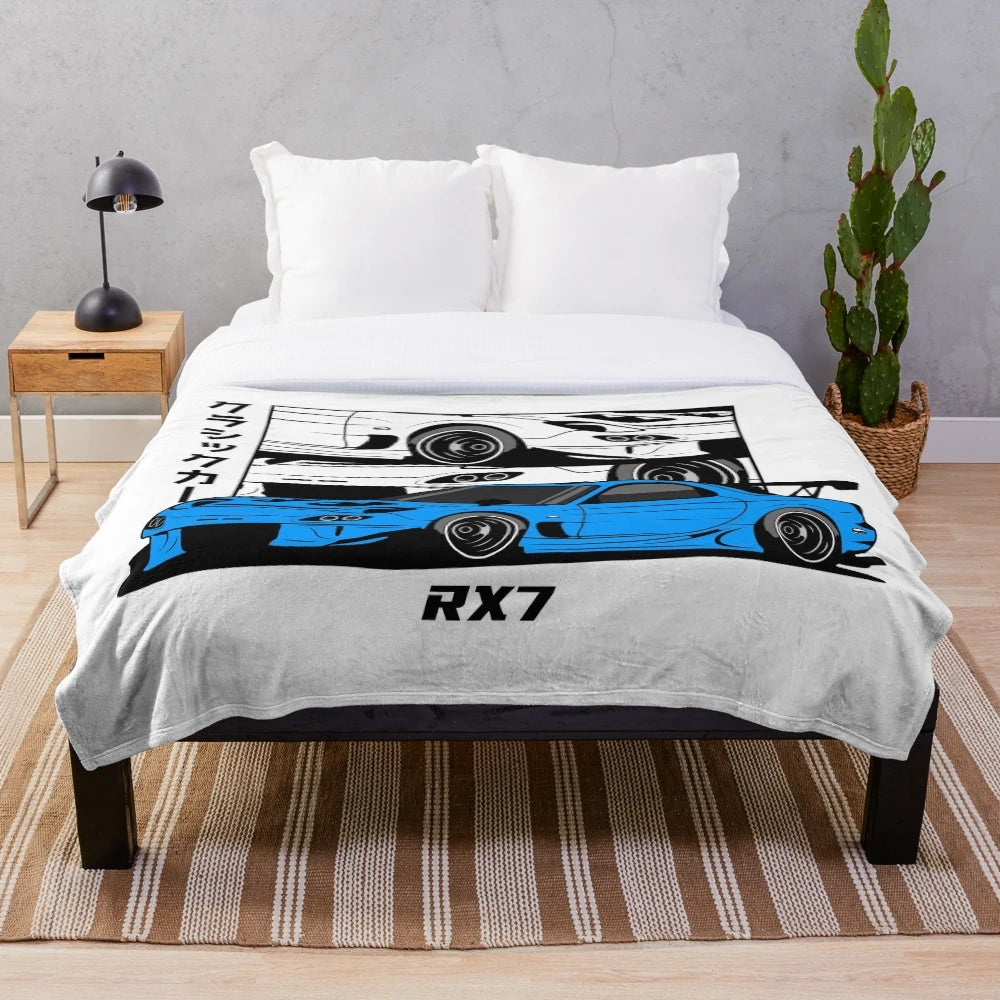 Blue plush blanket featuring a design inspired by the iconic Mazda RX7 FD3S rotary sports car