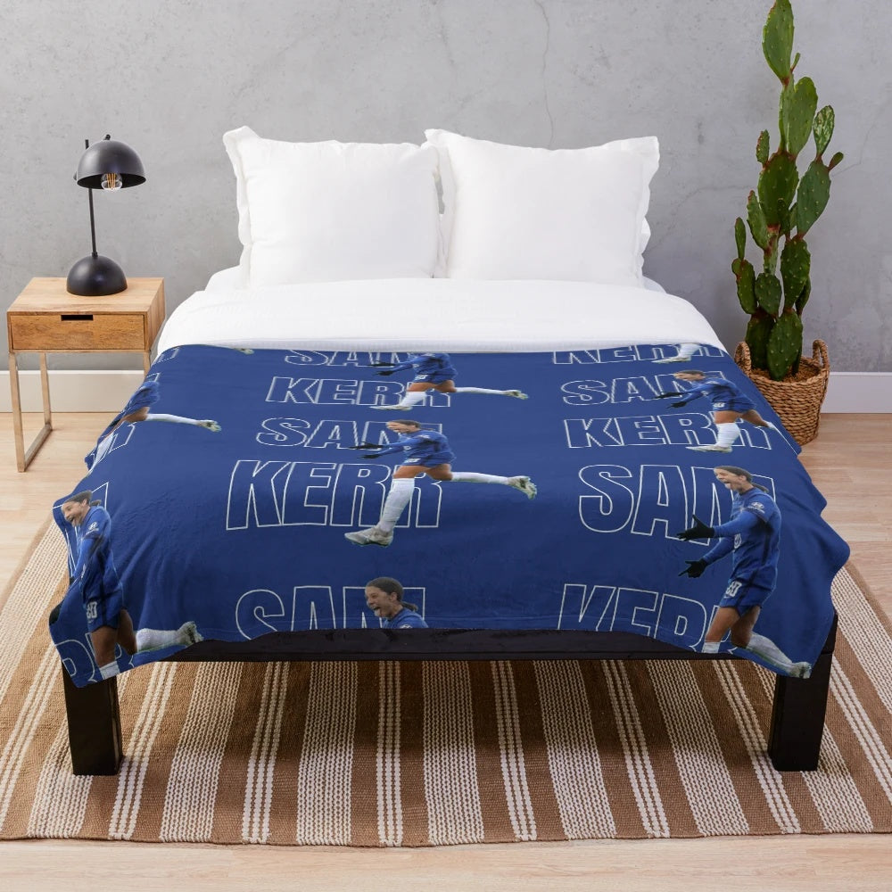Blue plush blanket with graphic design inspired by Chelsea FC and Australian soccer player Sam Kerr