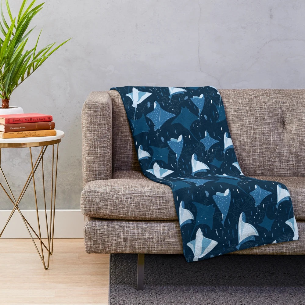 Blue plush blanket with a stylish stingray pattern design