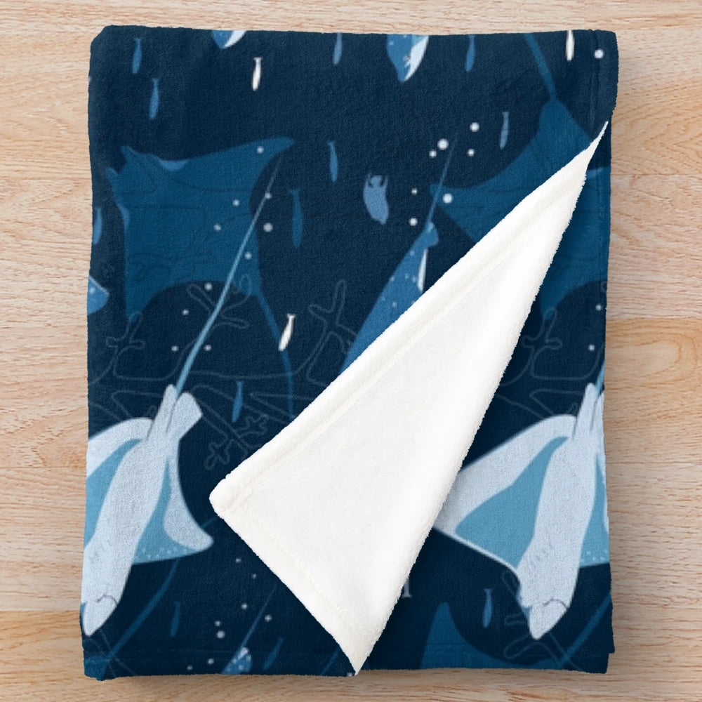 Blue plush blanket with a stylish stingray pattern design