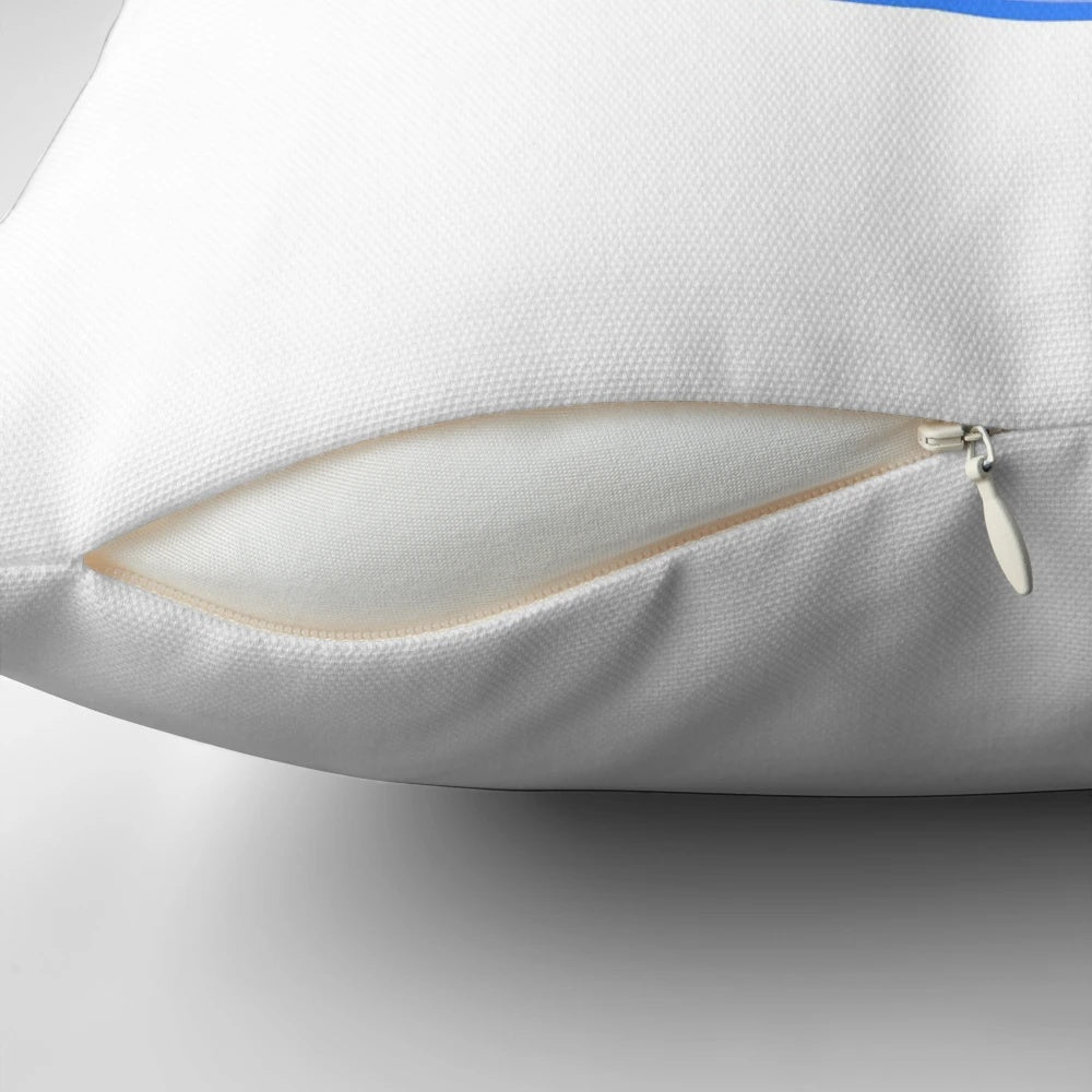 Blue smiley face pillow with lightning bolt design