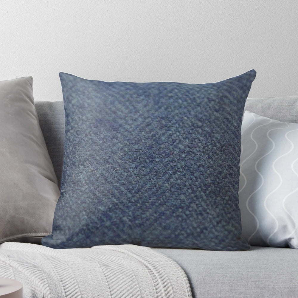 Blue tweed pillow with herringbone pattern, a stylish and cozy gift for fathers and brothers.