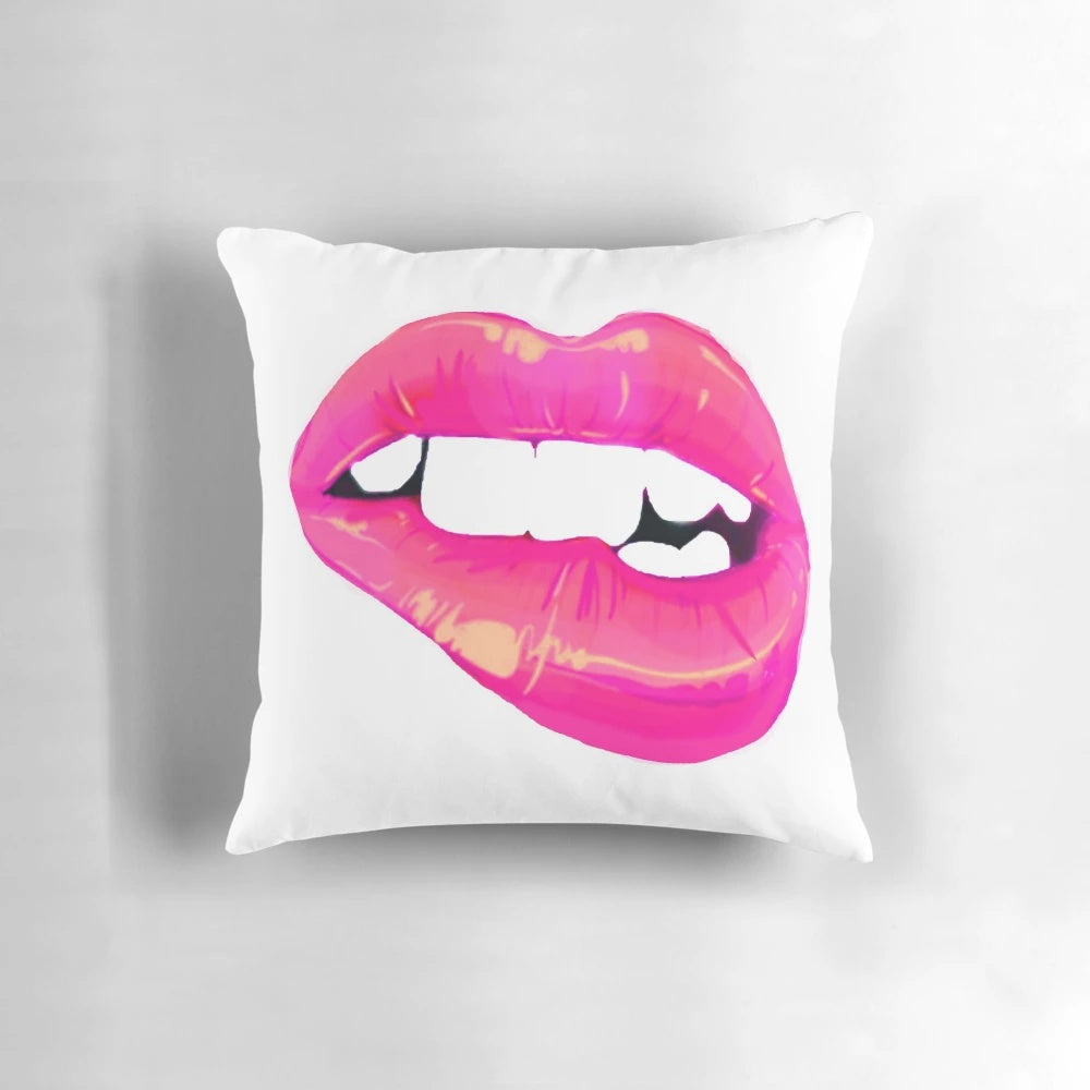 Bright pink decorative pillow with a teasing design for adding a touch of vibrancy to any room.