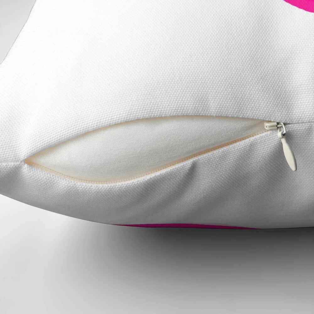 Bright pink decorative pillow with a teasing design for adding a touch of vibrancy to any room.