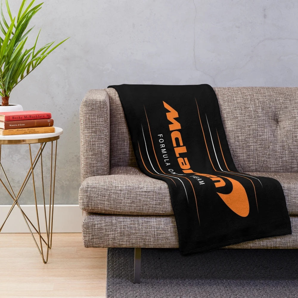 British motor racing inspired plush blanket featuring the Mclaren logo