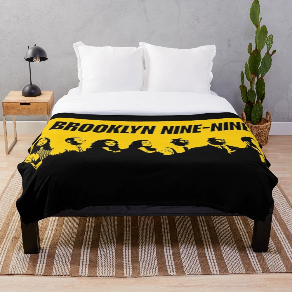Brooklyn Nine Nine inspired plush blanket featuring a stencil-style wallpaper design