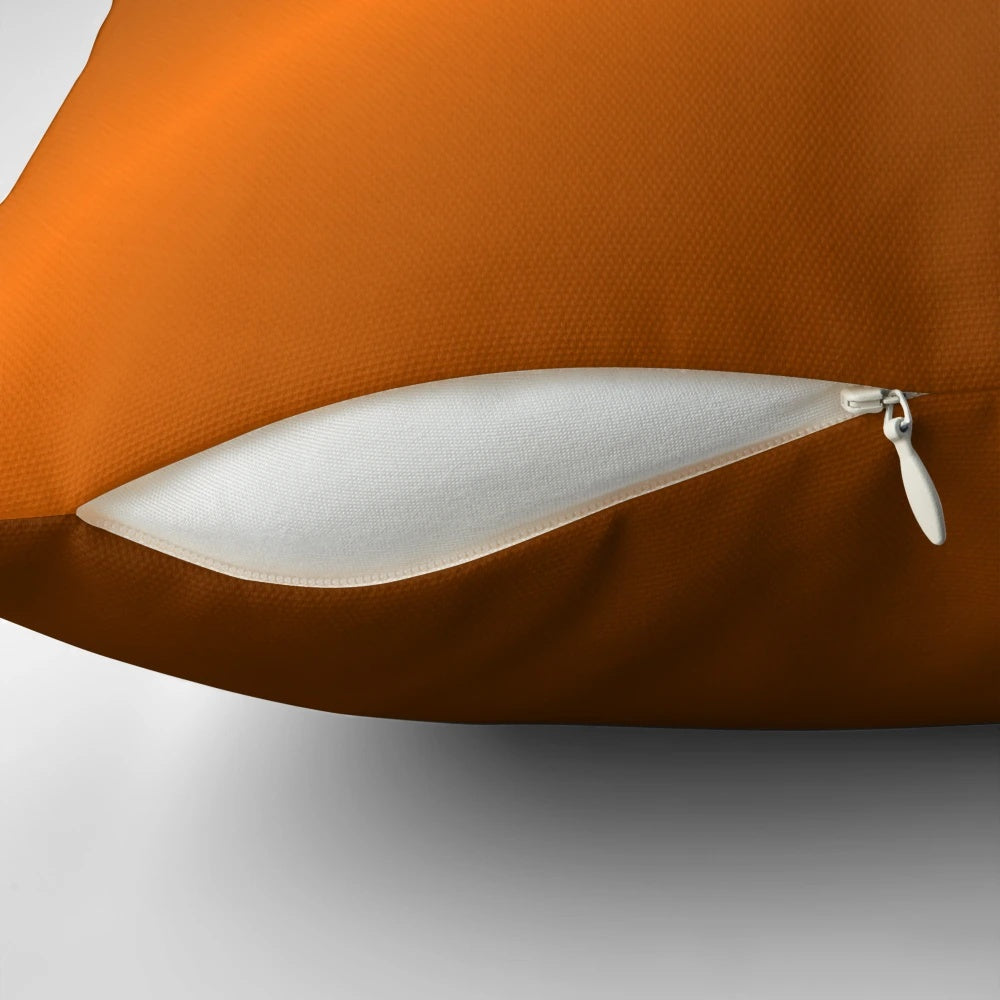 Brushed copper decorative pillow with circular design