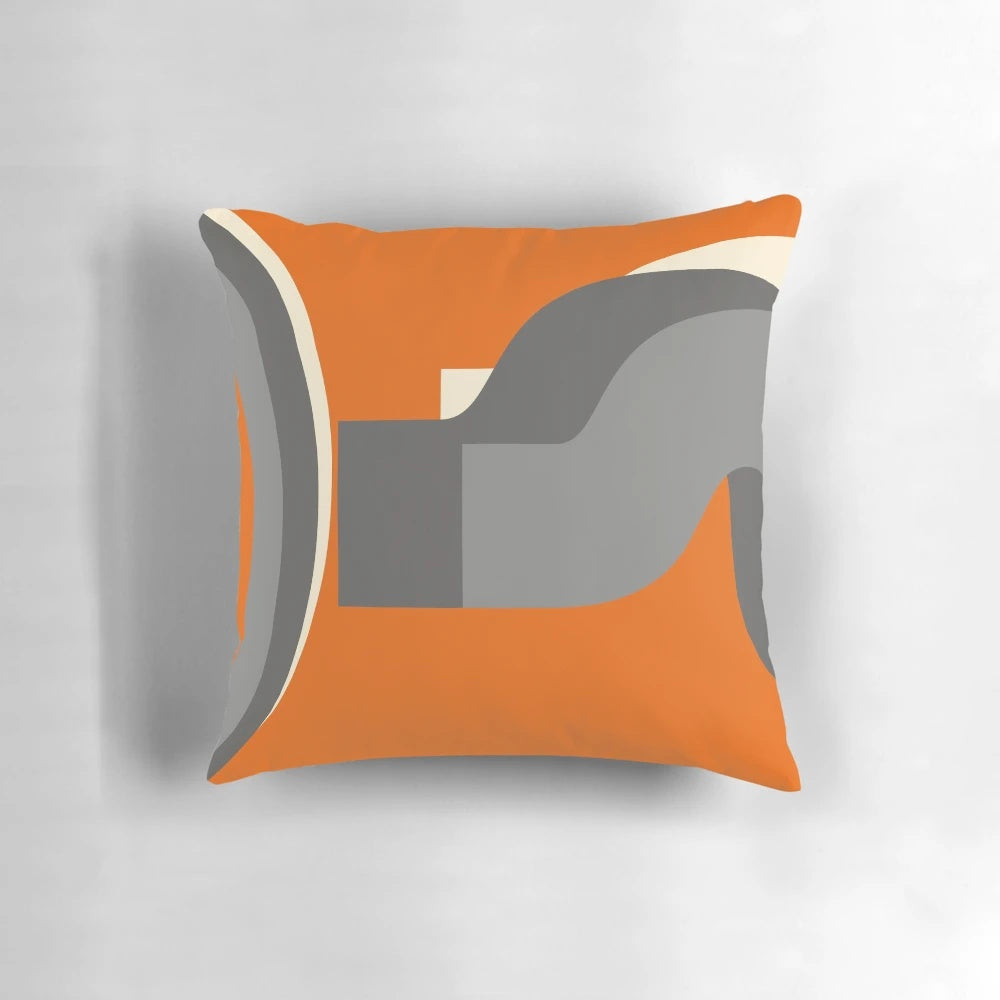 Burnt orange retro-style pillow with grey accents, perfect for adding a vintage touch to your living space.
