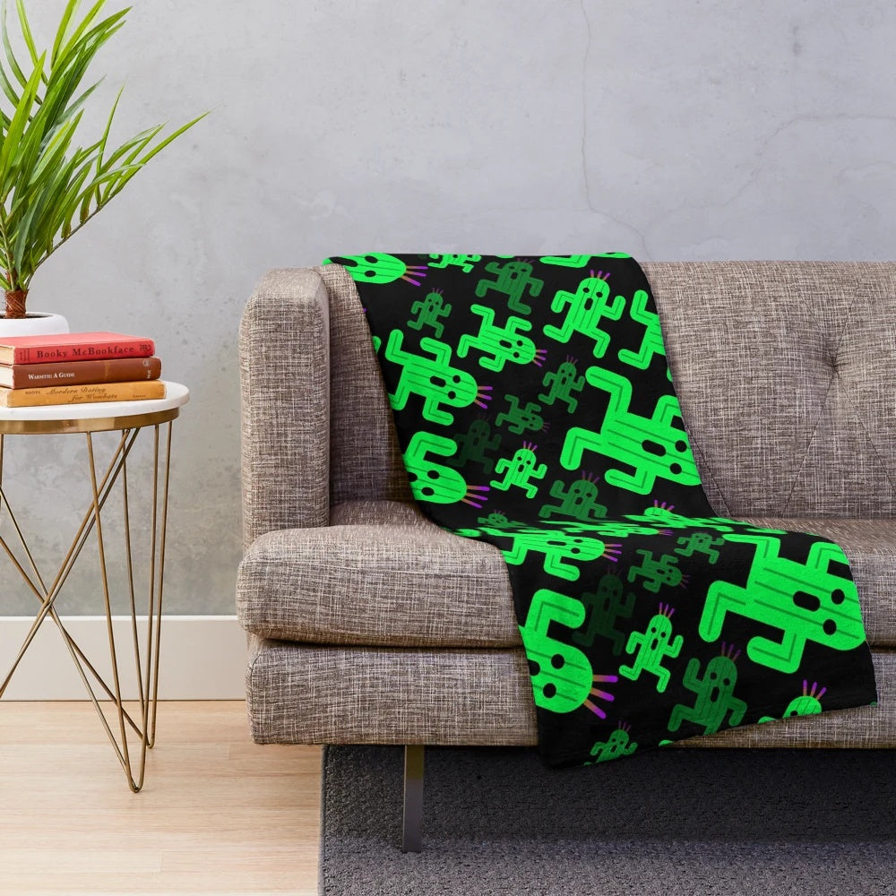 A cozy and soft plush blanket featuring the iconic Cactuar character from the Final Fantasy video game series.