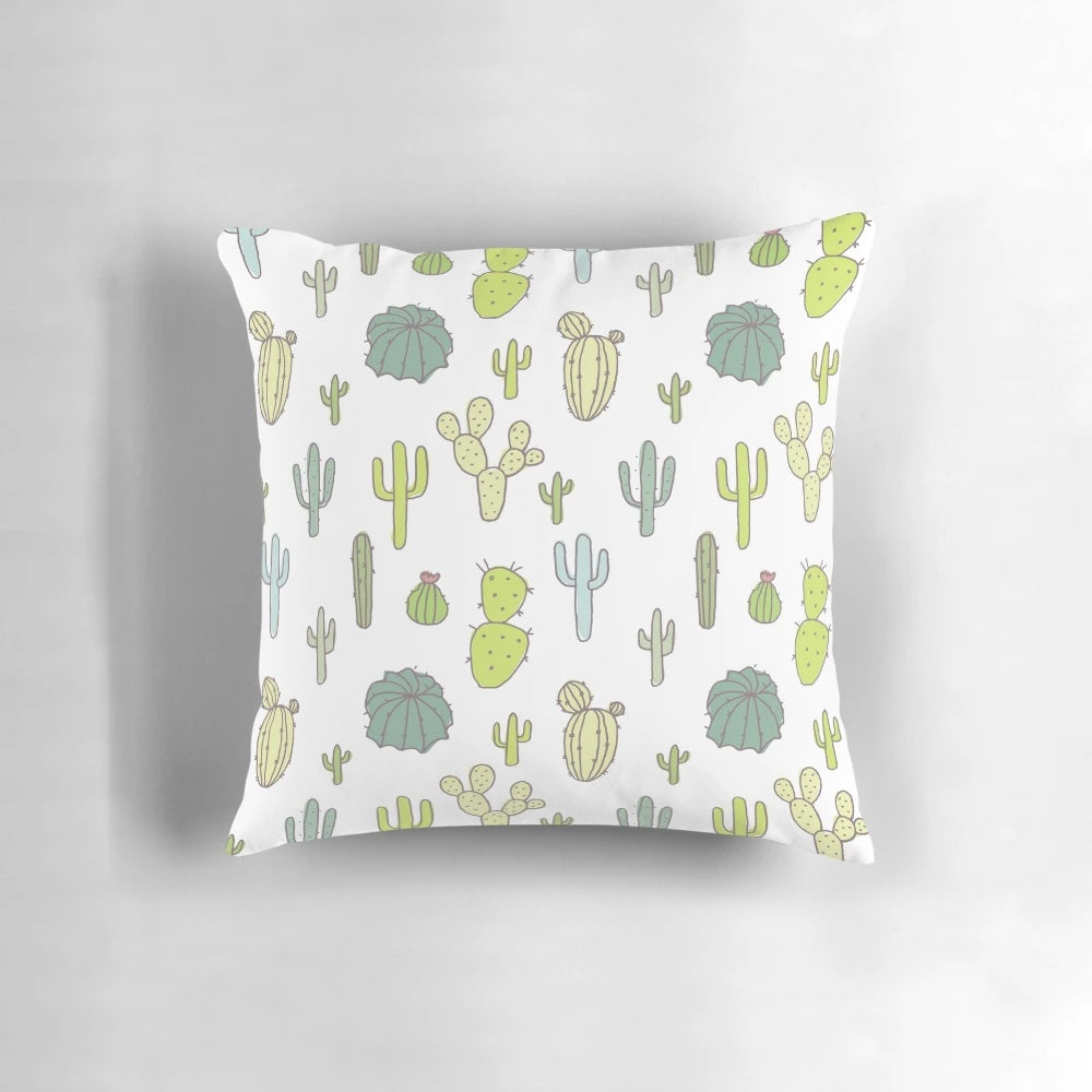 Vibrant cactus print pillow with pink, green, and tropical patterns for a modern, nature-inspired look.