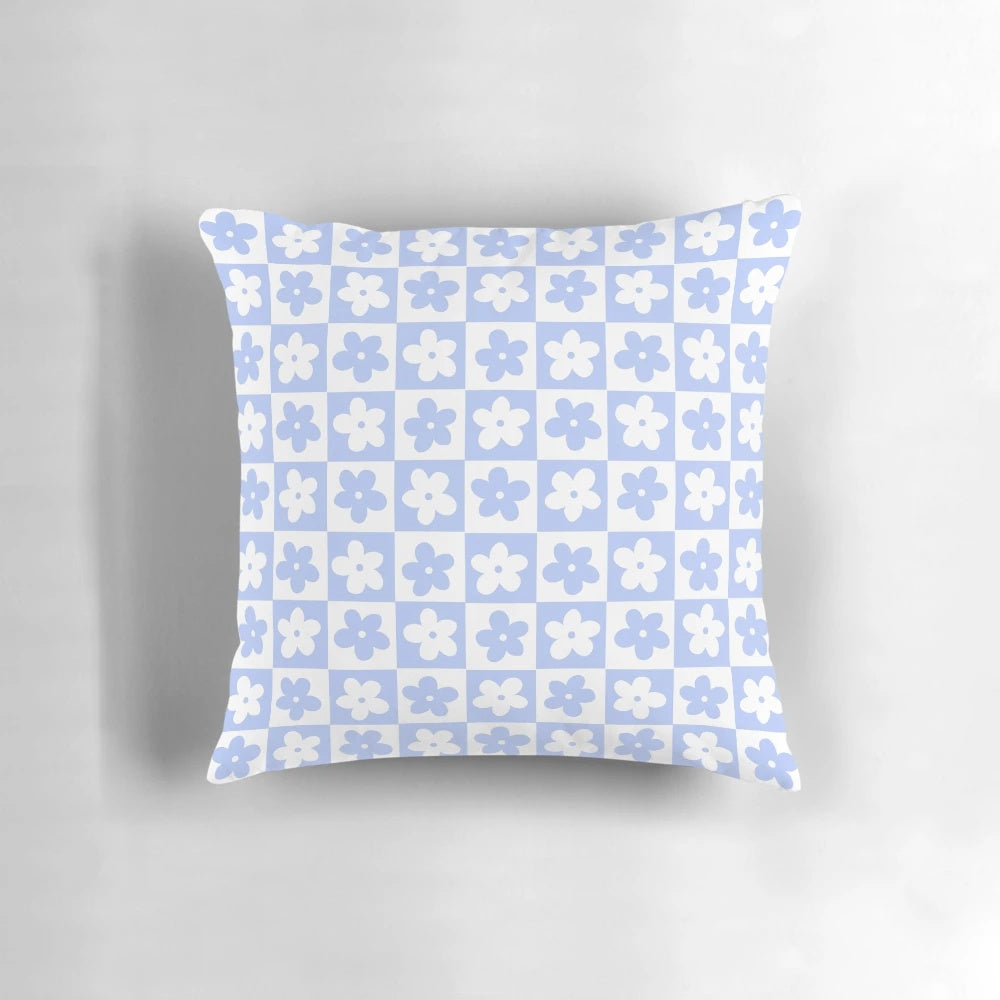 Periwinkle and white checkered pillow with delicate floral pattern
