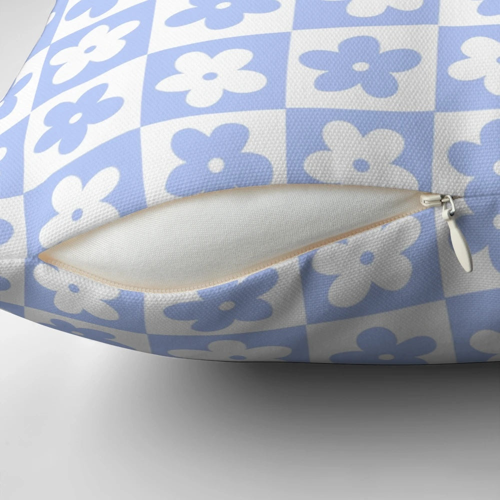 Periwinkle and white checkered pillow with delicate floral pattern