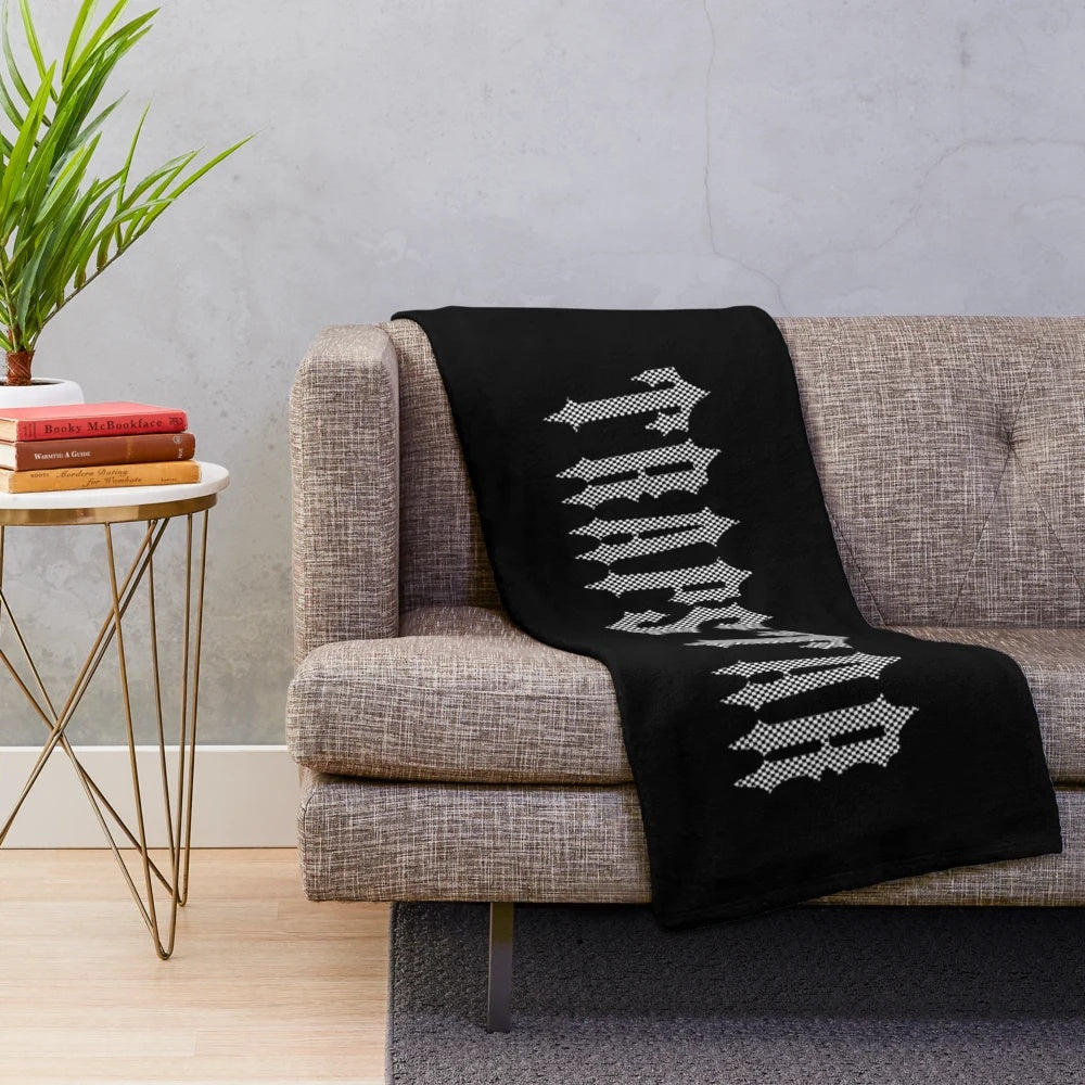 Checkered pattern plush blanket with London-inspired design