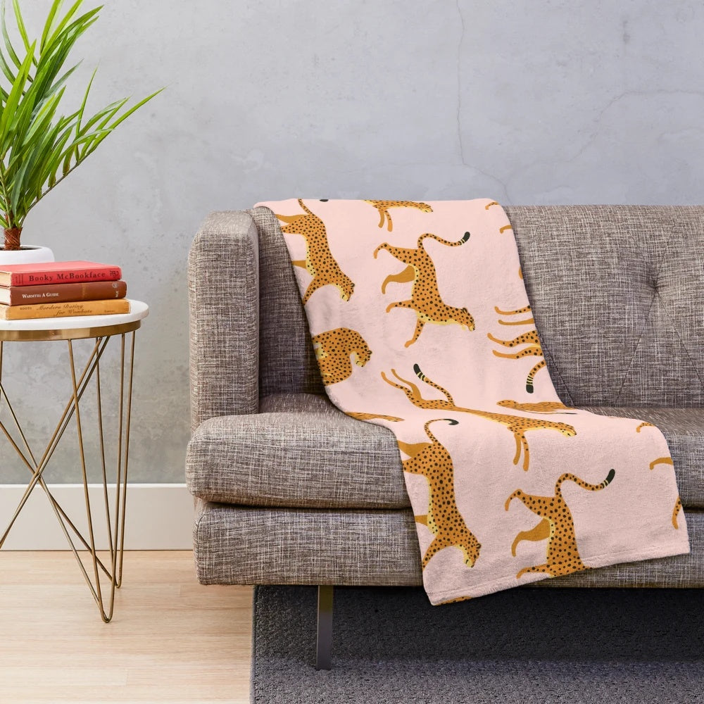 Soft and vibrant cheetah print plush blanket