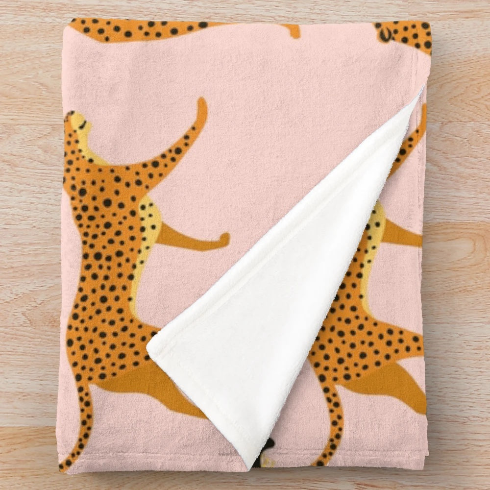 Soft and vibrant cheetah print plush blanket