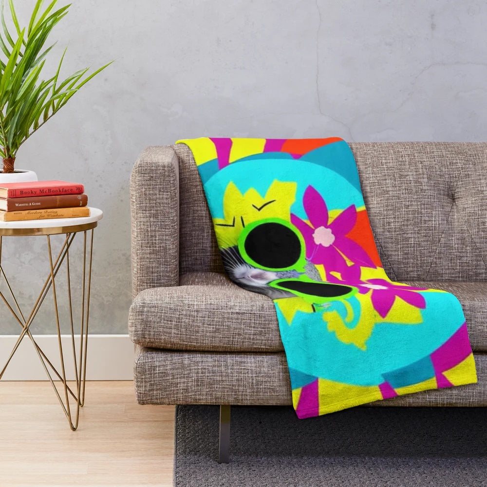 A colorful plush blanket featuring a chinchilla wearing sunglasses and floral accents in a pop art style.