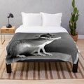 A colorful and stylish chinchilla portrait plush blanket with a playful, pop art inspired design.