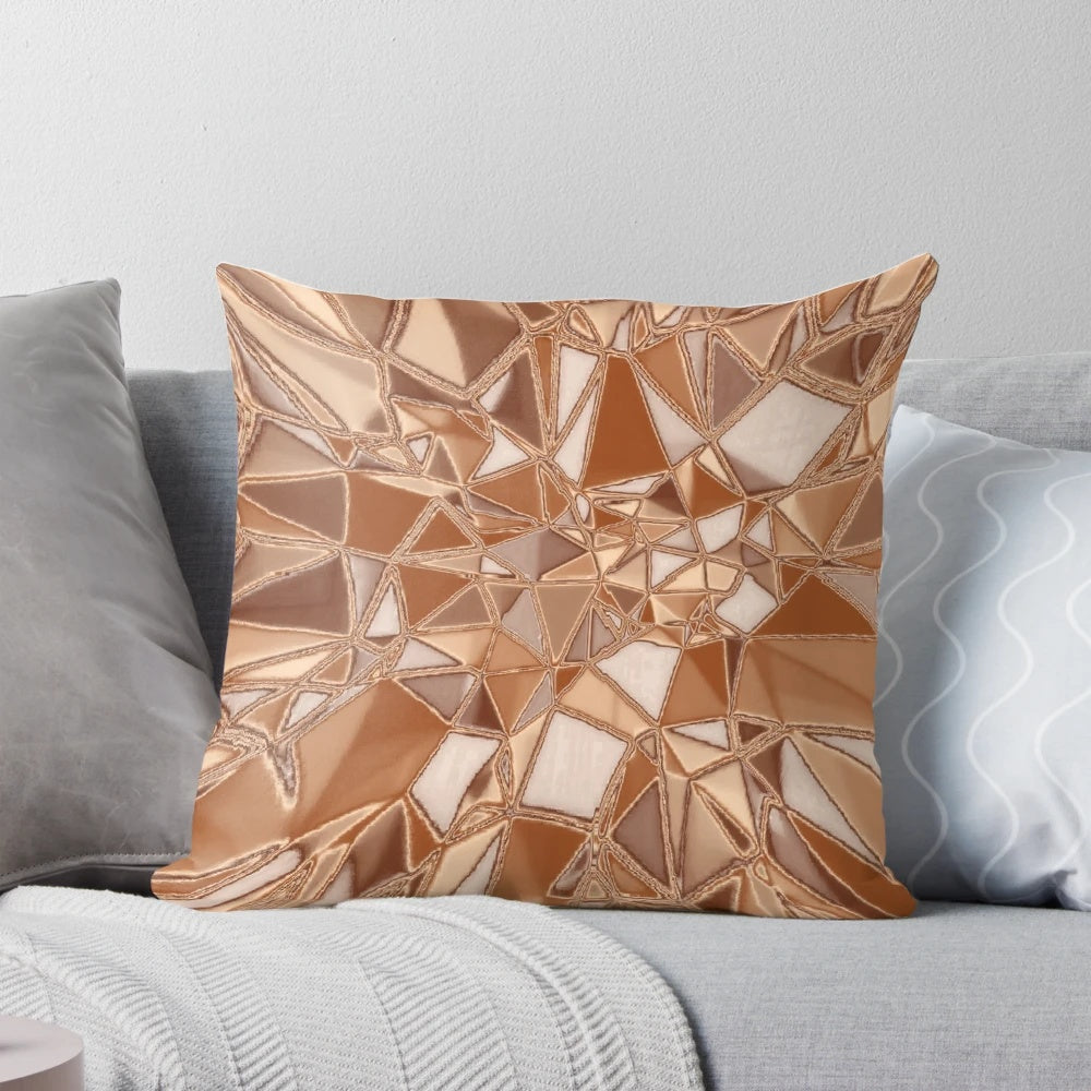 Copper tan metal graphic decorative pillow with a shimmering, metallic finish