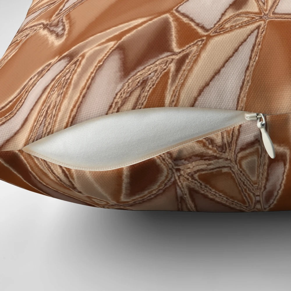 Copper tan metal graphic decorative pillow with a shimmering, metallic finish