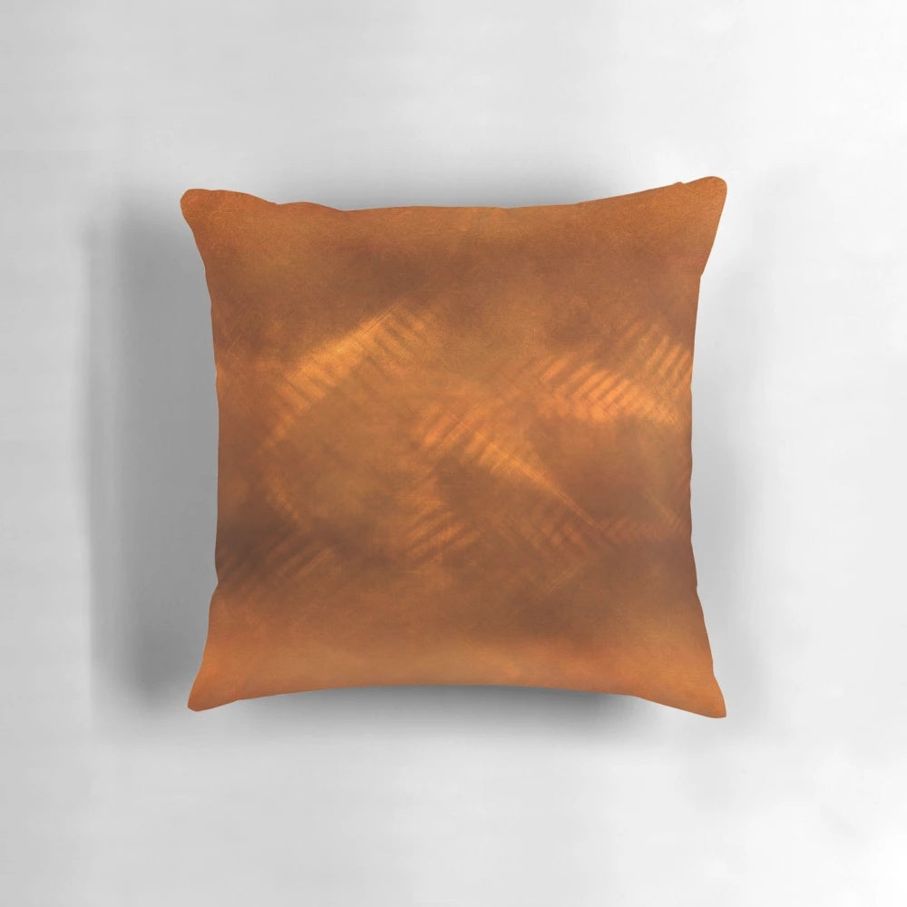 Orange copper-colored decorative pillow for home accents