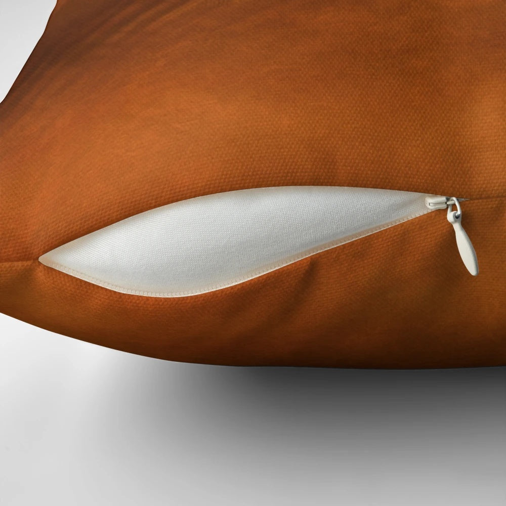 Orange copper-colored decorative pillow for home accents