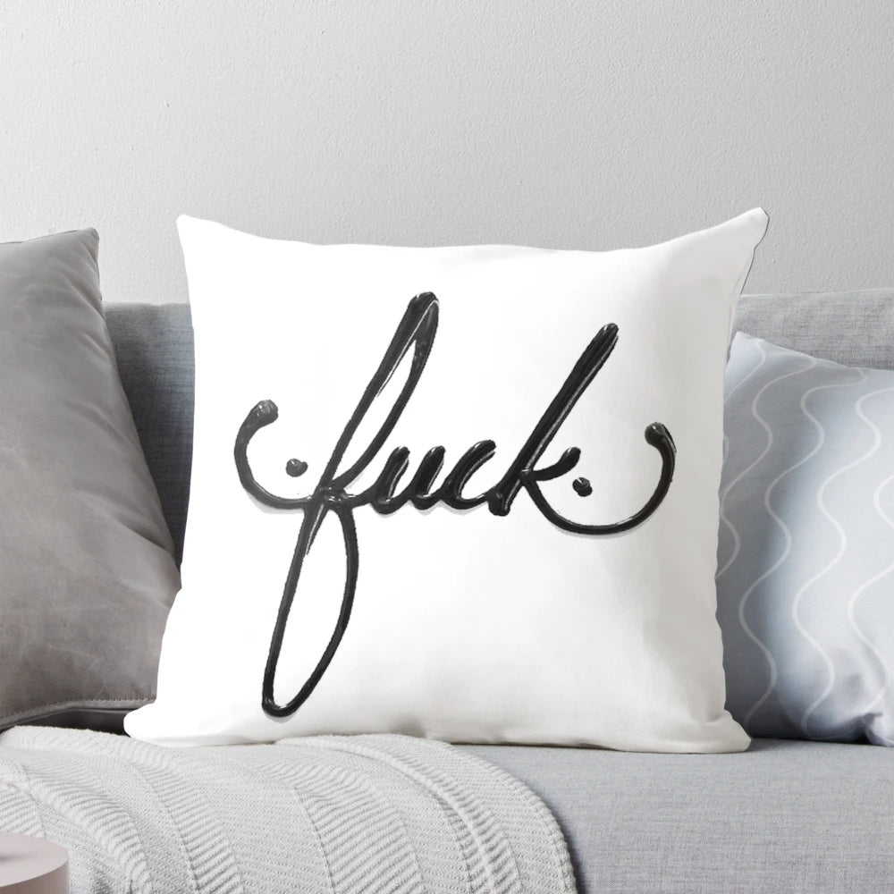 Cursive text accent pillow with a simple, black and white grunge design