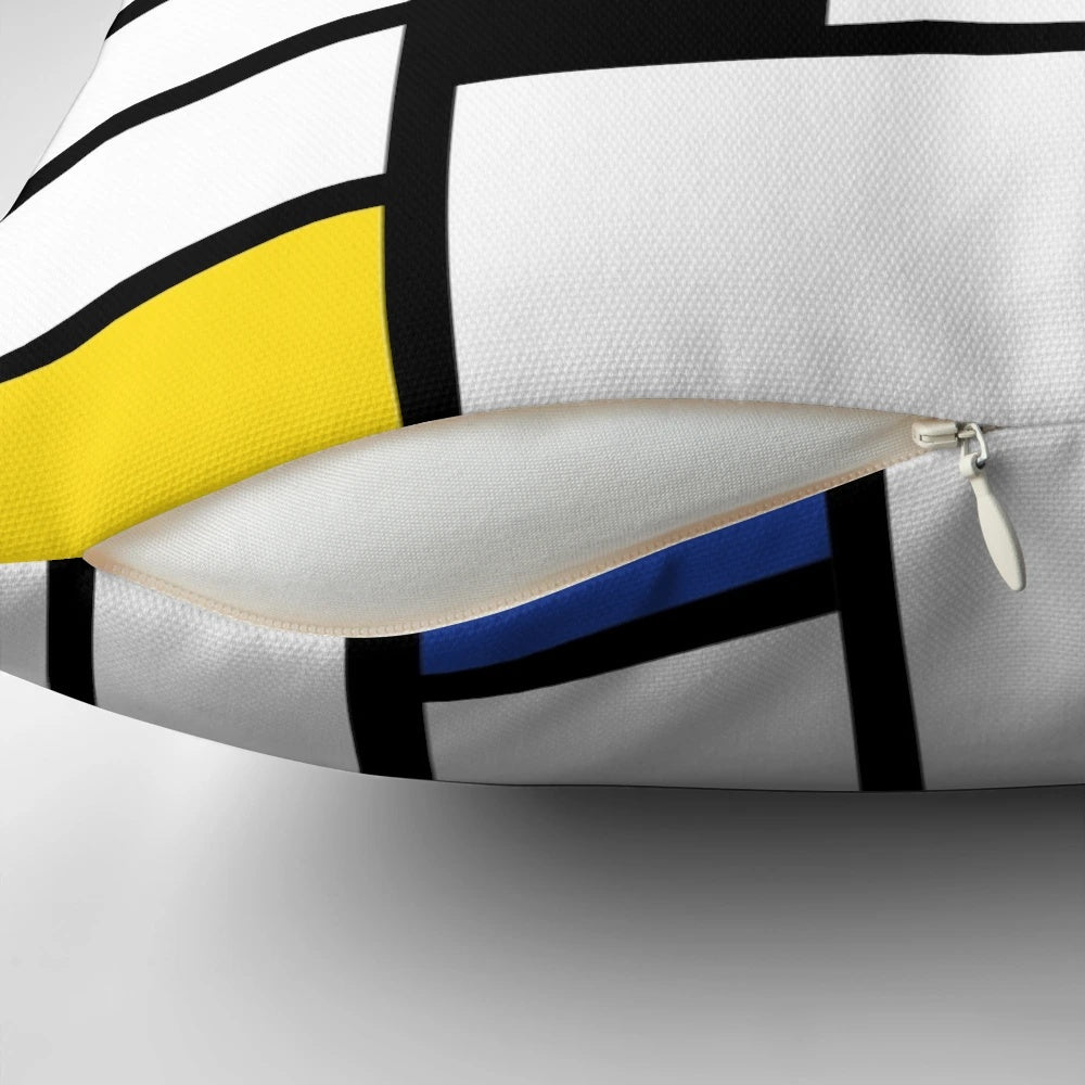 De Stijl-inspired primary color pillow with a Mondrian-style design