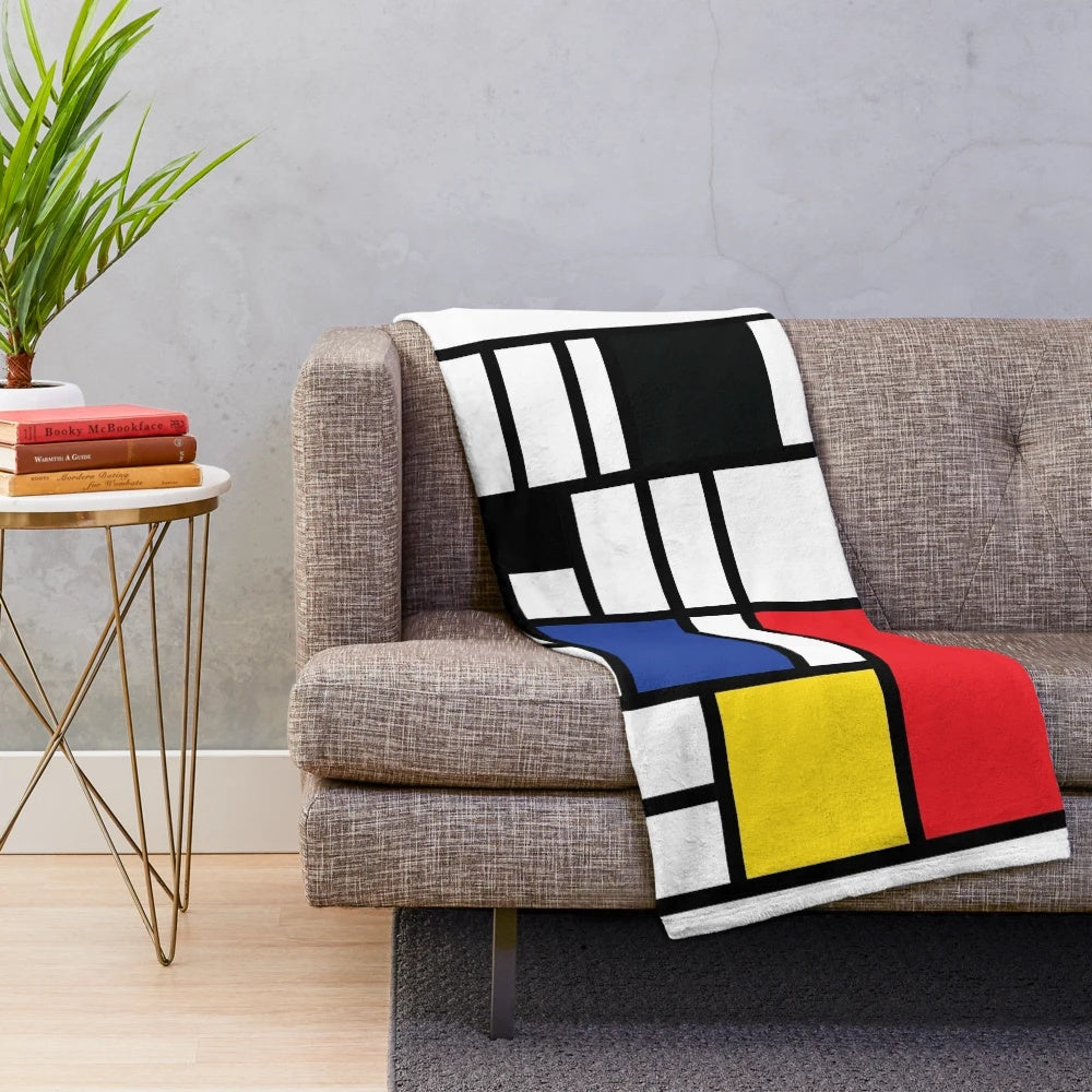De Stijl inspired plush blanket with primary color block design