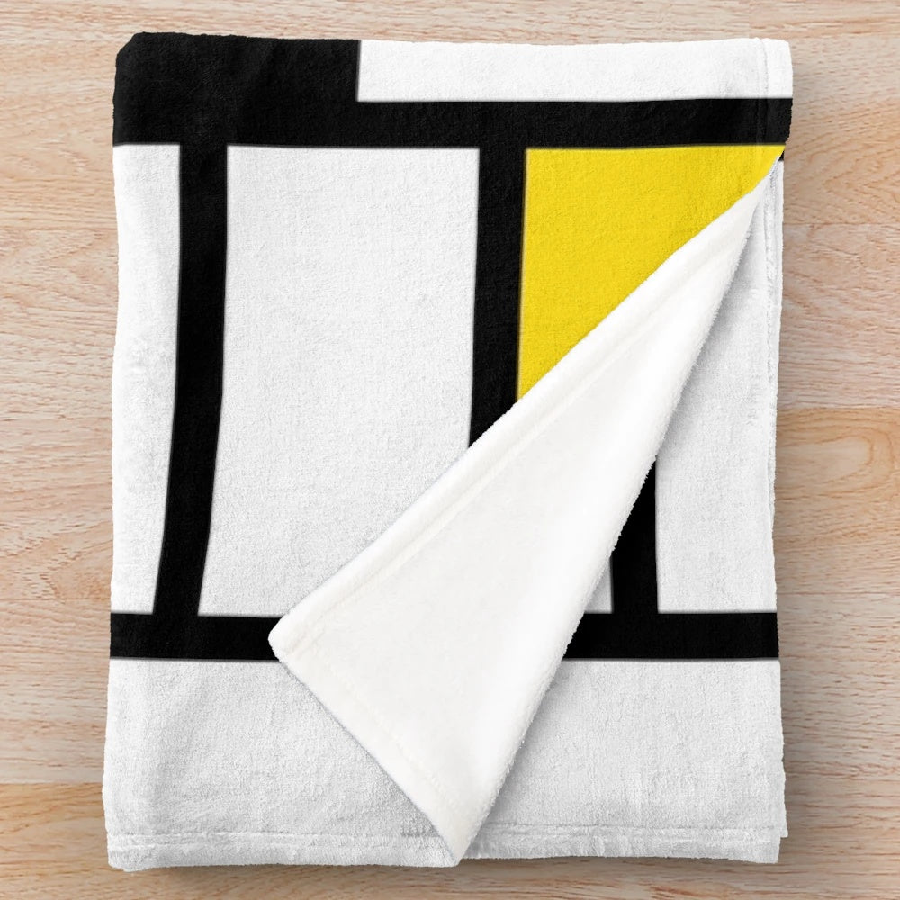 De Stijl inspired plush blanket with primary color block design