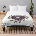 Stylish and cozy plush blanket with a designer touch