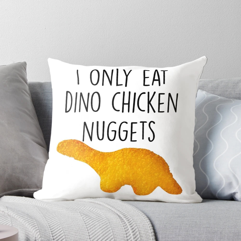 A soft and cozy pillow featuring a playful dinosaur design, perfect for fans of dinosaurs and chicken nuggets.