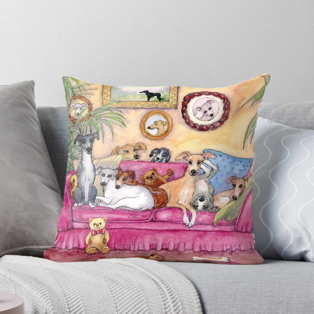 Greyhounds and whippets lounging comfortably on a sofa with a Pillow POD product