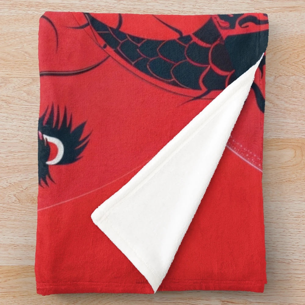 A vibrant and stylized plush blanket featuring a modern dragon portrait