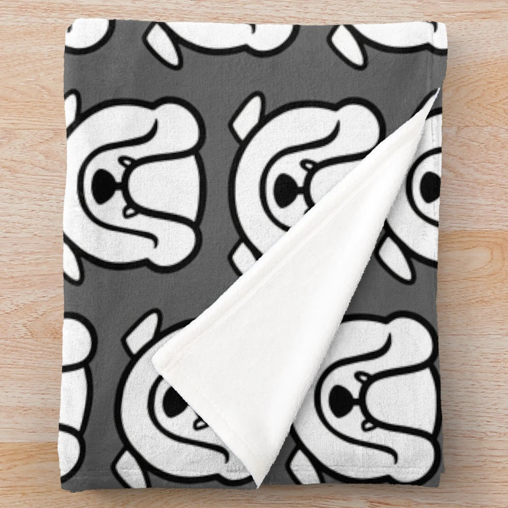 Black and white English bulldog silhouette on a gray plush blanket