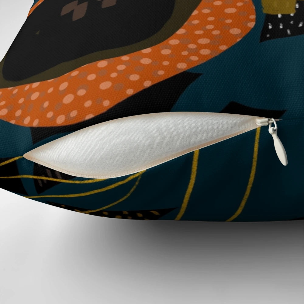 Vibrant evening meadow-inspired pillow with a modern floral pattern in shades of orange and blue.