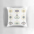 Decorative white pillow featuring a vibrant blue evil eye design