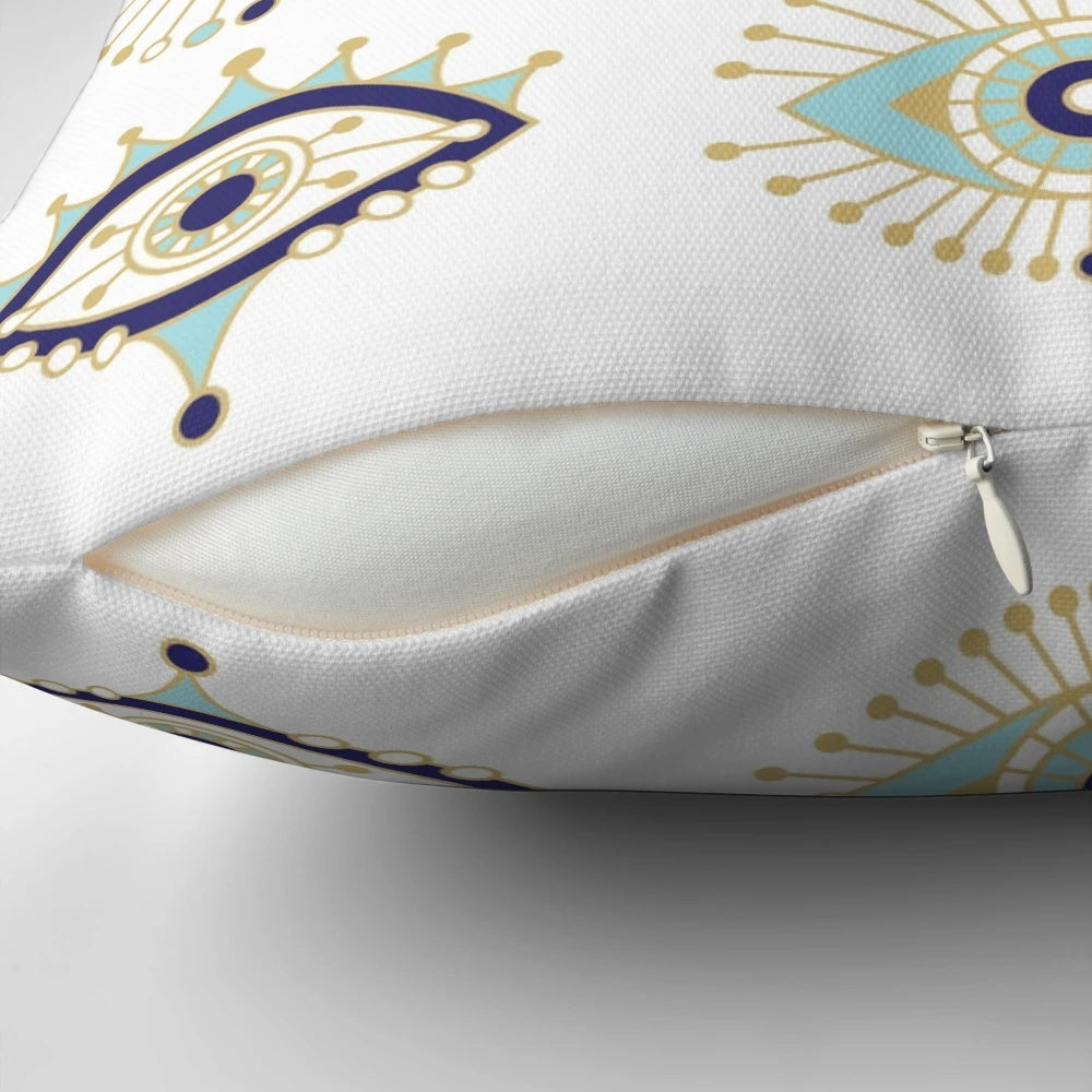 Decorative white pillow featuring a vibrant blue evil eye design