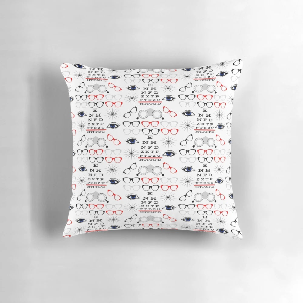 Decorative pillow featuring an eye chart pattern in red and black, designed for eye doctors, ophthalmologists, and opticians.