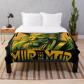 Colorful graphic plush blanket with futuristic city skyline design