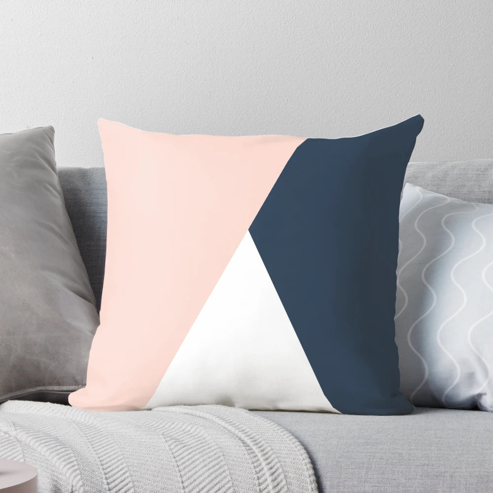 Geometric blush pink and navy blue decorative pillow
