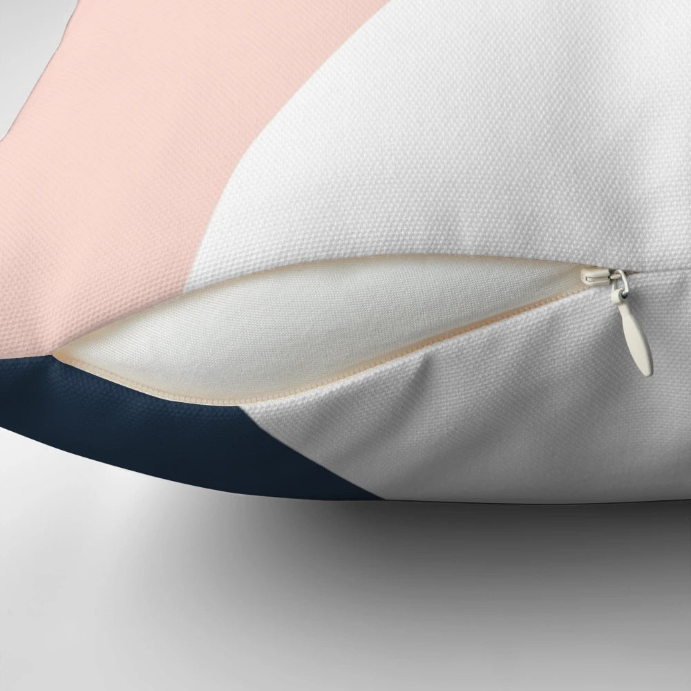 Geometric blush pink and navy blue decorative pillow