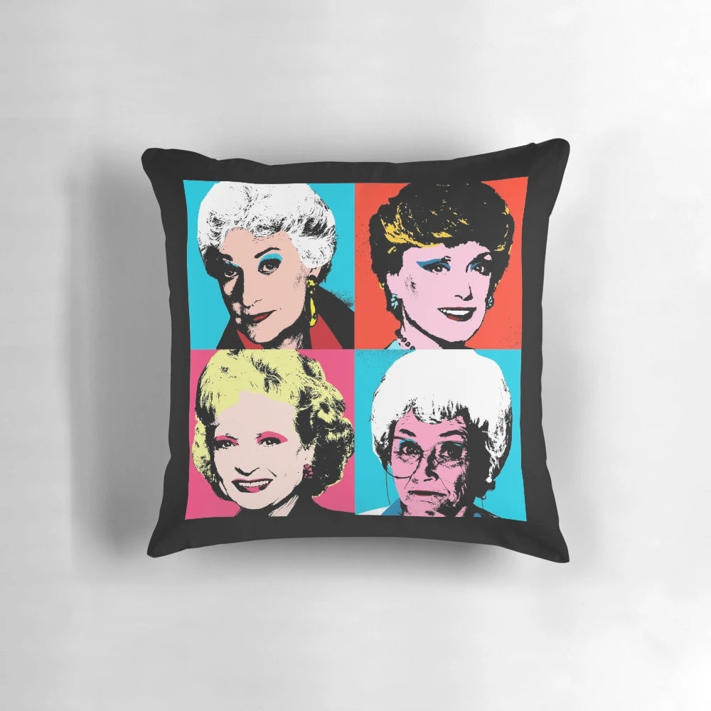Colorful pop art style portrait of the Golden Girls characters on a soft, decorative pillow.