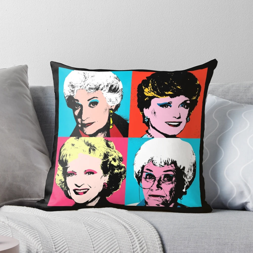 Colorful pop art style portrait of the Golden Girls characters on a soft, decorative pillow.