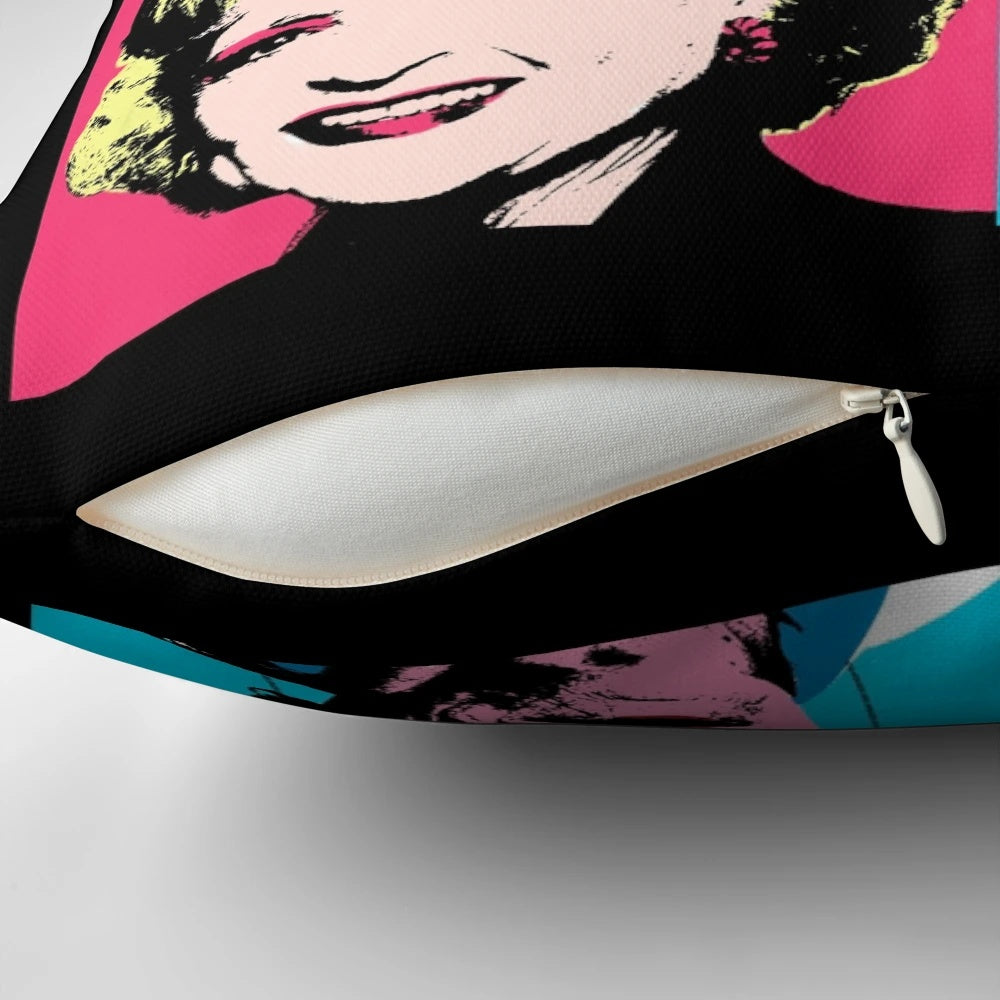 Colorful pop art style portrait of the Golden Girls characters on a soft, decorative pillow.