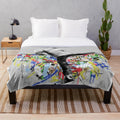 Pop culture inspired plush blanket featuring graffiti art design