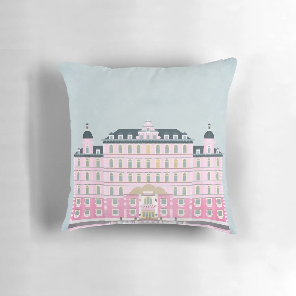 Minimalist art pillow featuring the iconic Grand Budapest Hotel from the Wes Anderson film
