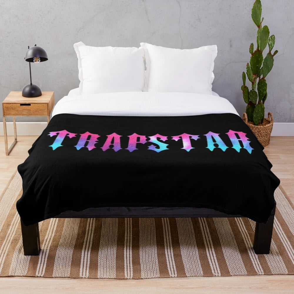 Plush blanket with a graphic print design