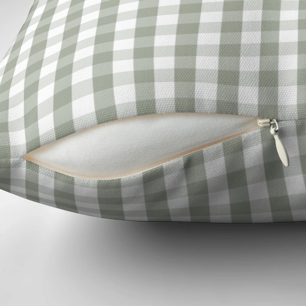 Gray, green, and white gingham patterned decorative pillow