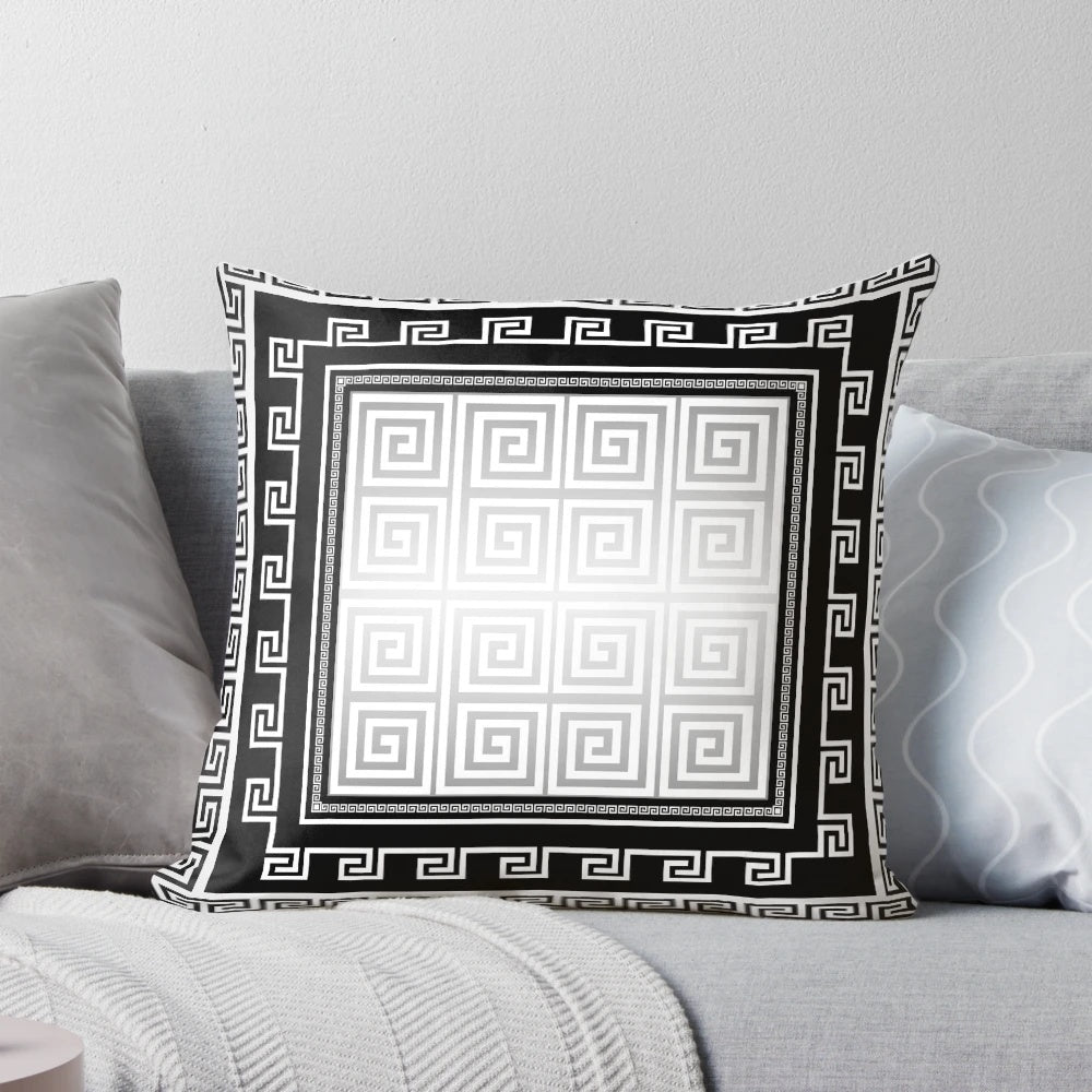 Greek key pattern decorative pillow in black, white, and gray