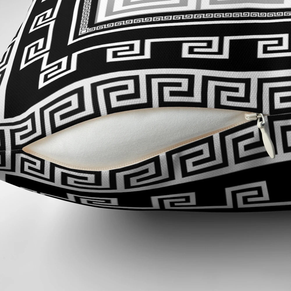 Greek key pattern decorative pillow in black, white, and gray